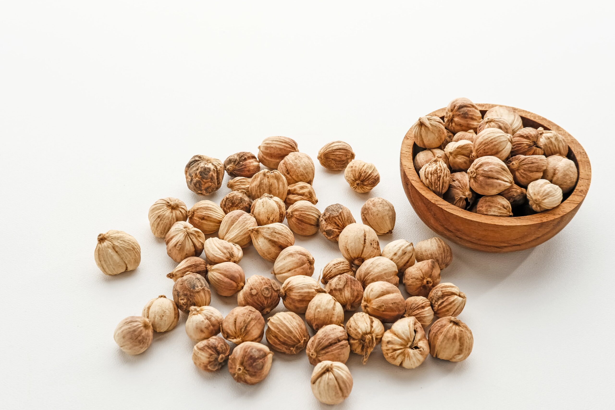 1679668028__cardamom-siam-cardamom-kapulaga-white-background-dried-seeds-dried-herb-spice-min